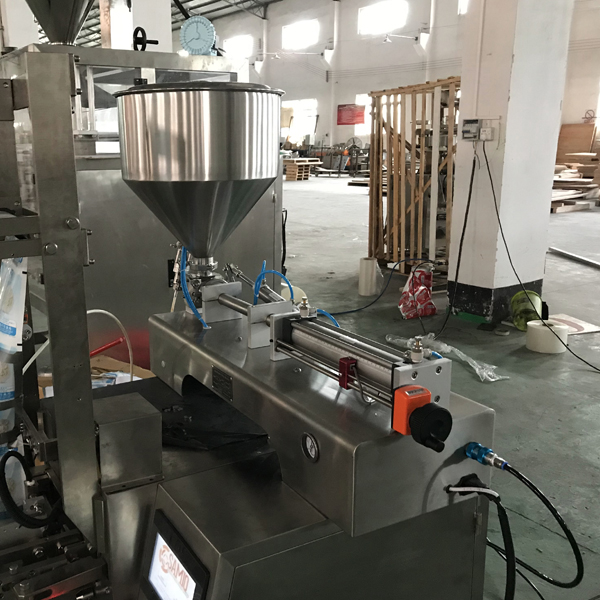 Liquid bag filling machine feeding system